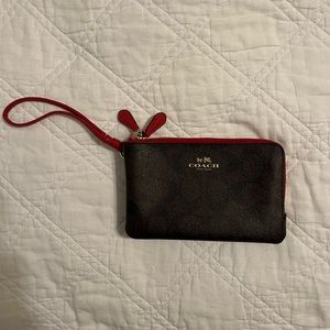 Coach wristlet wallet with red detail
